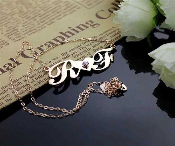 Dozens of individual initial rings comprise this necklace