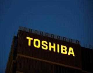 Japan's Toshiba lowers its profit forecast following a weak second quarter.