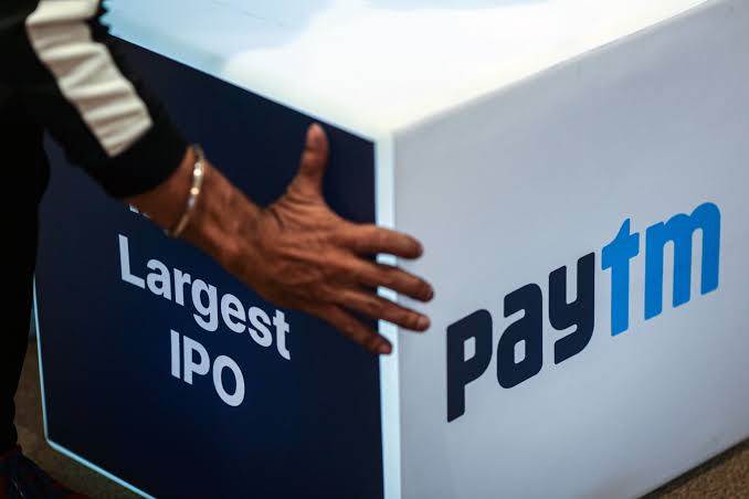 On news of the sale of a Softbank stake, shares of Paytm Parent One97 decline.