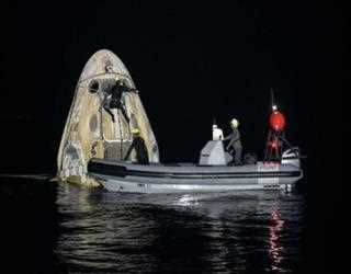 4 astronauts are returned from the International Space Station by a SpaceX capsule.