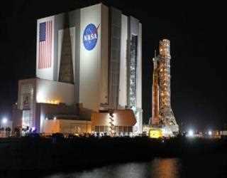 NASA's Massive Rocket Pulls Up To The Launch Pad For An Unmanned Moon Mission
