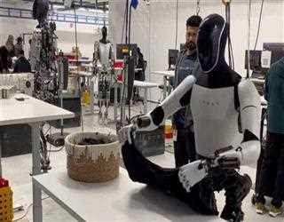 Latest shared video by Elon Musk shows Tesla Robot folding shirts